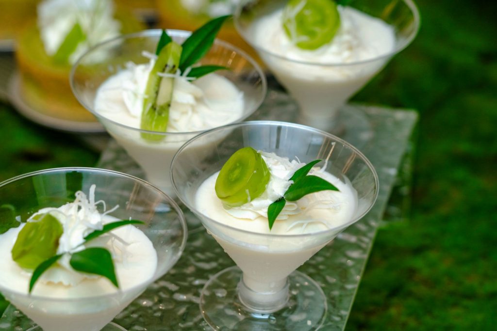Chilled desserts in small glasses.